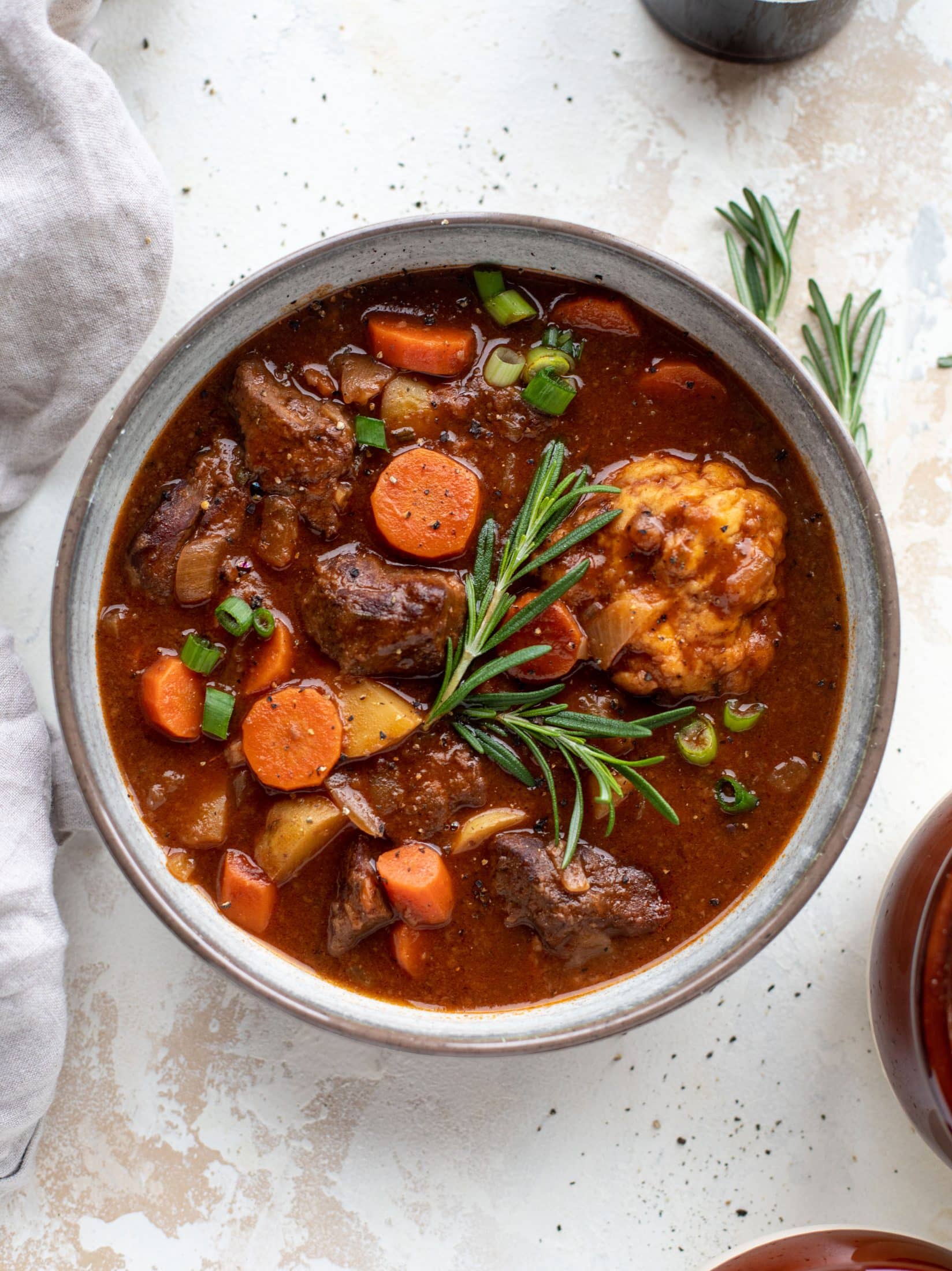 My new favorite soup! Irish stout beef stew is flavorful and hearty and topped with delicious herb dumplings. Perfect comfort food.