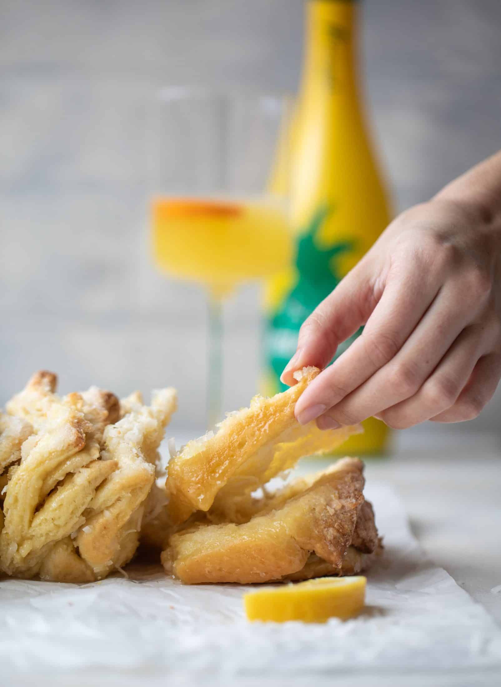 This lemon coconut bread is a pull apart dream! It's perfect for brunch or dessert with the perfect amount of fluffiness. 