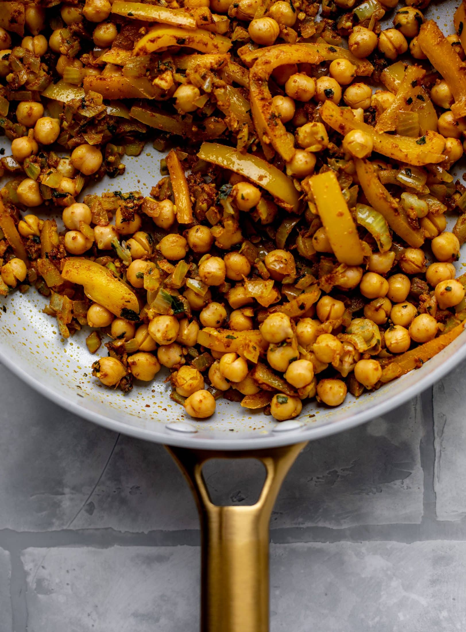 This basil chickpea coconut curry comes together in 20 minutes! Serve with jasmine rice or your favorite naan, or both! So easy and flavorful.