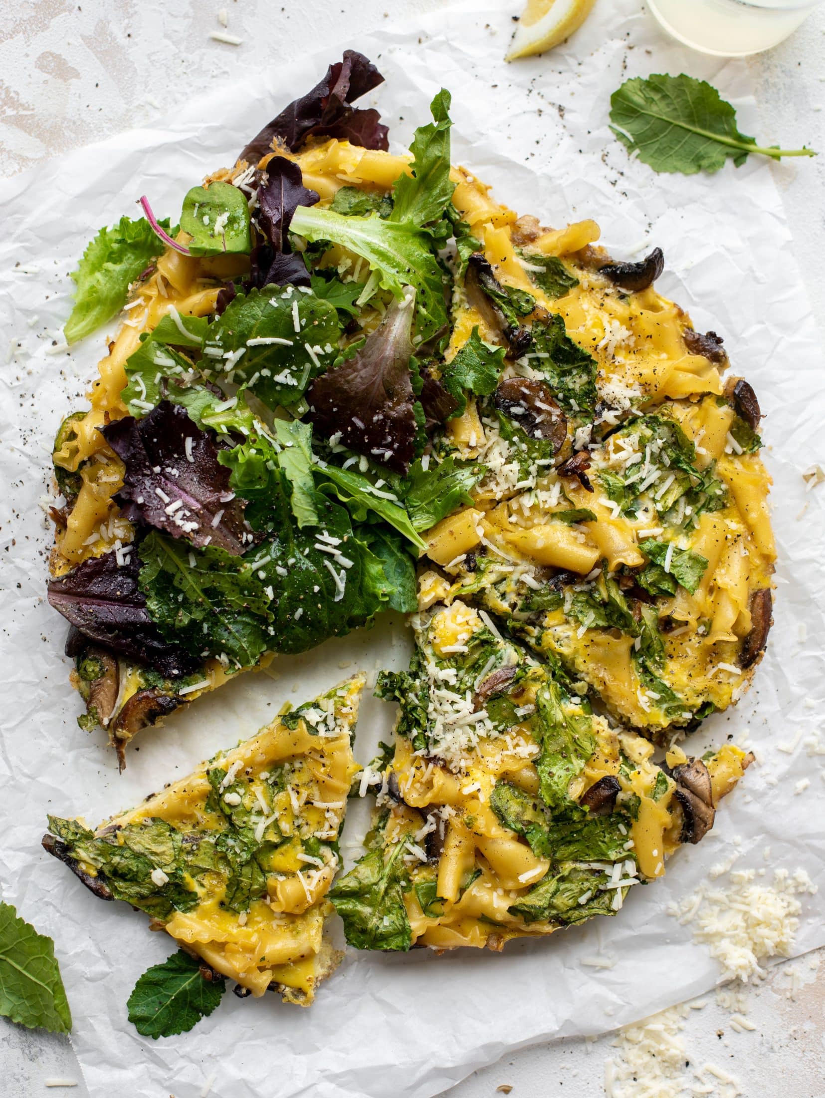This super easy pasta frittata uses leftover ingredients and can be prepped ahead of time. Leftovers are great and it's satisfying and delicious!