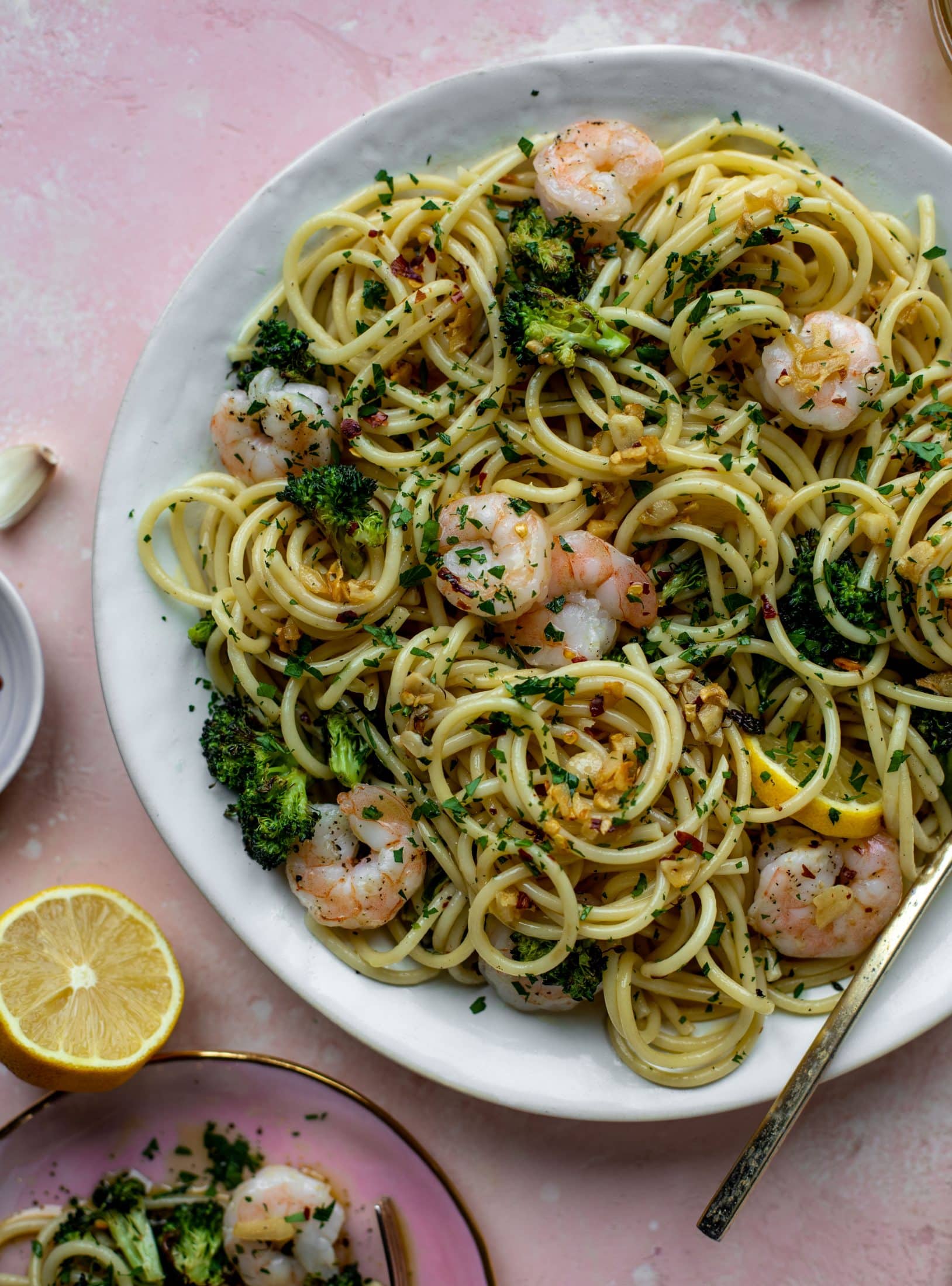 This garlic sauce pasta is incredible! Roasted shrimp and broccoli twirled with garlic oil noodles and crushed red pepper. Divine!