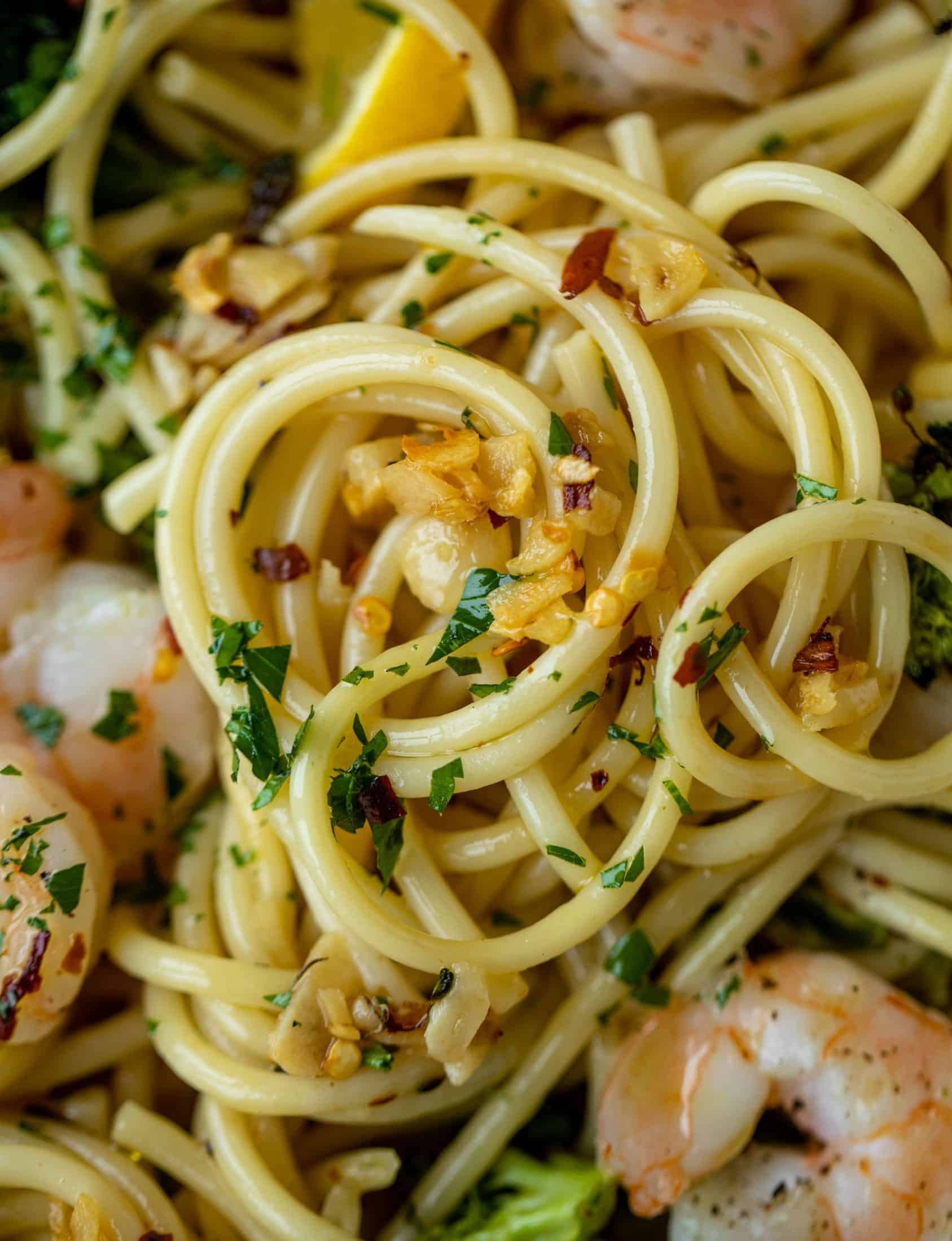 This garlic sauce pasta is incredible! Roasted shrimp and broccoli twirled with garlic oil noodles and crushed red pepper. Divine!