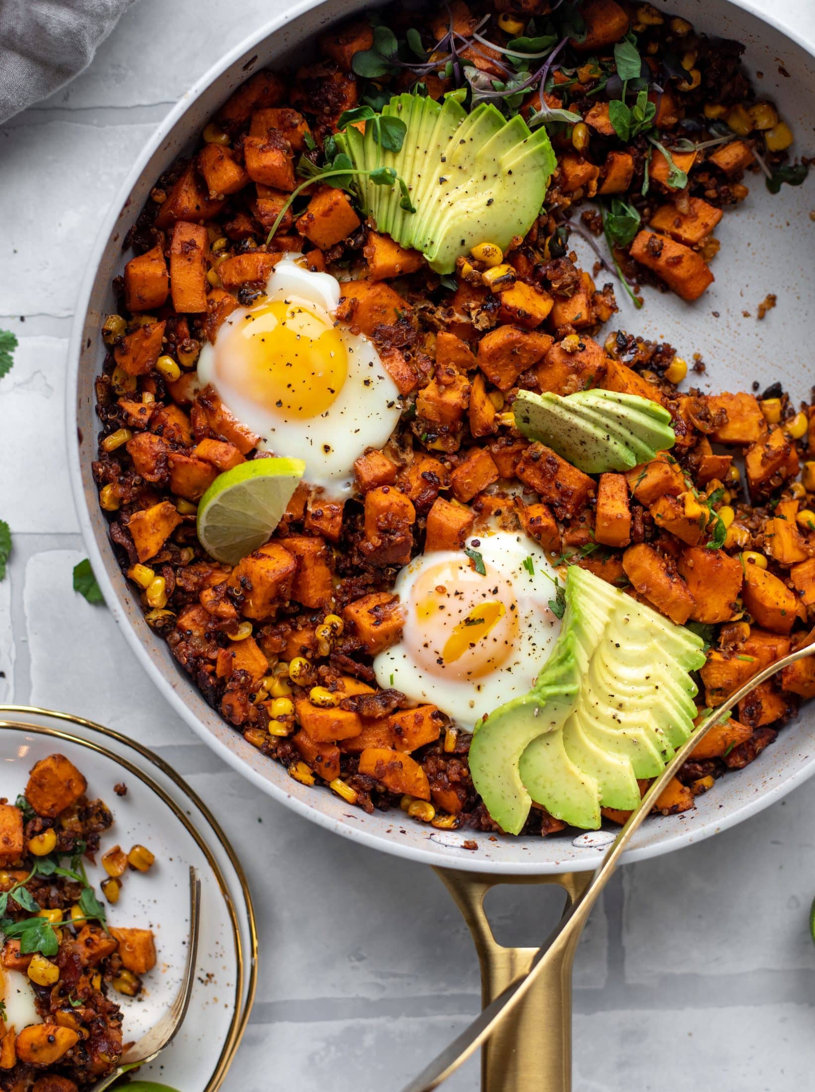 This chipotle sweet potato hash is perfect for breakfast, lunch or dinner. Bulked up with quinoa and tons of flavor, it's a great pantry weeknight meal!