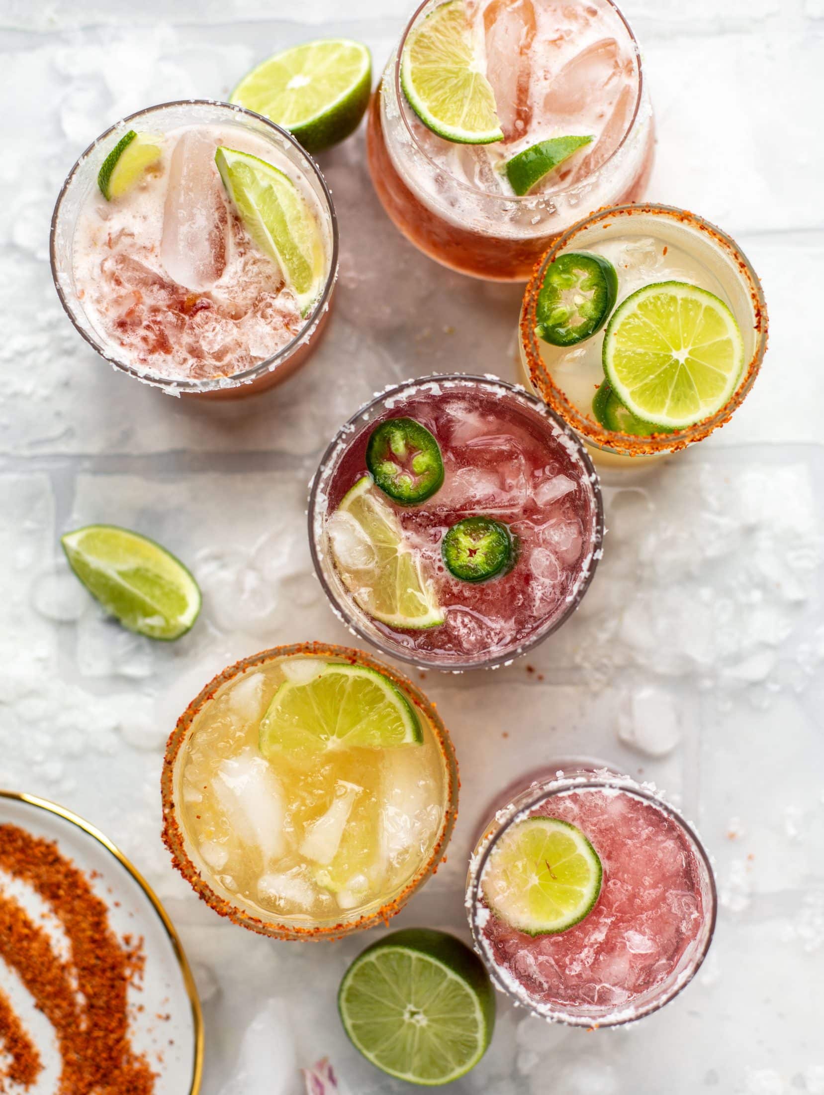 These bubbly jam margaritas are easy and delicious! Use your favorite jam instead of simple syrup to create a fruity flavor everyone will love.