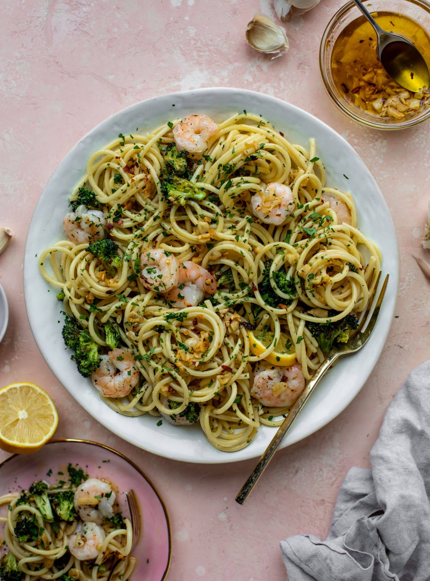 This garlic sauce pasta is incredible! Roasted shrimp and broccoli twirled with garlic oil noodles and crushed red pepper. Divine!