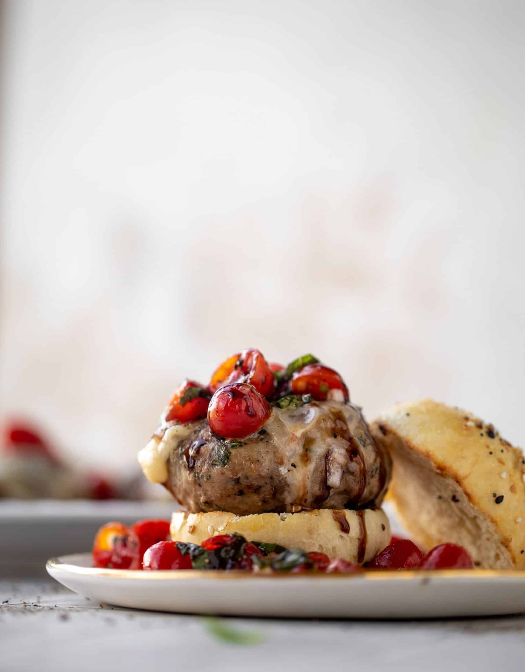 open faced bruschetta chicken burger close up 