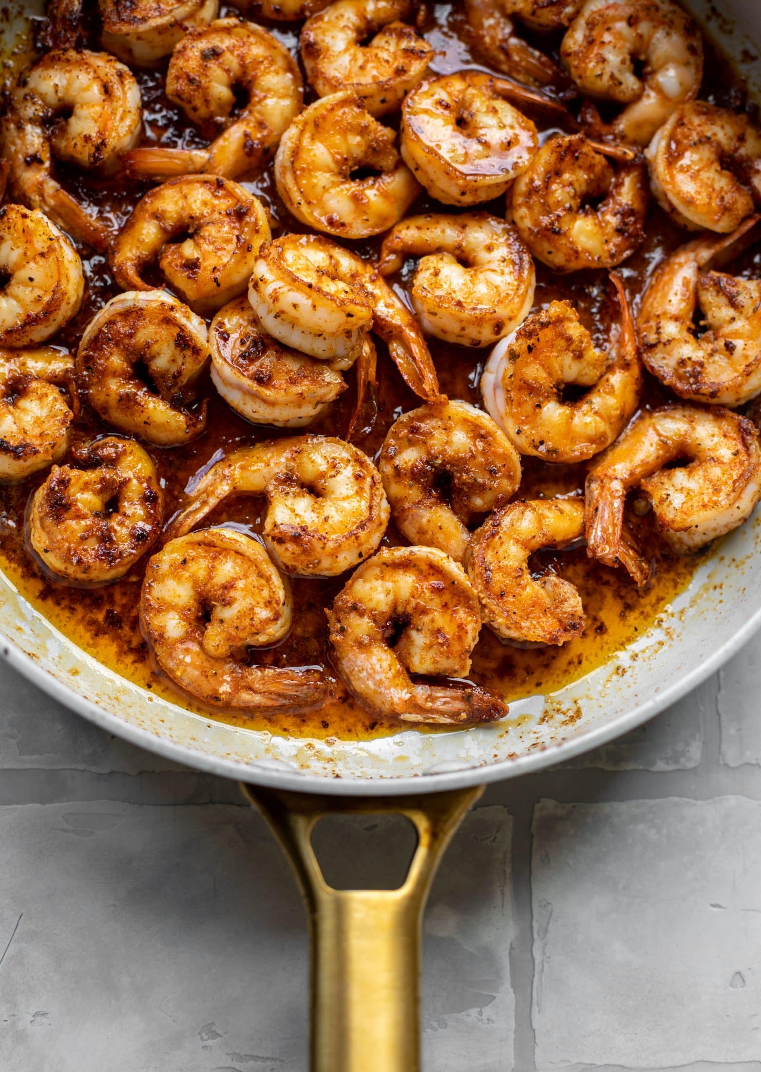 honey mustard cajun shrimp in a skillet