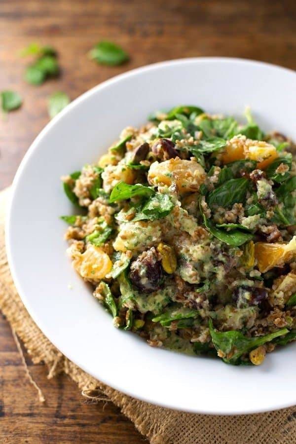 Moroccan Salad with Cilantro Orange Dressing in a white bowl.