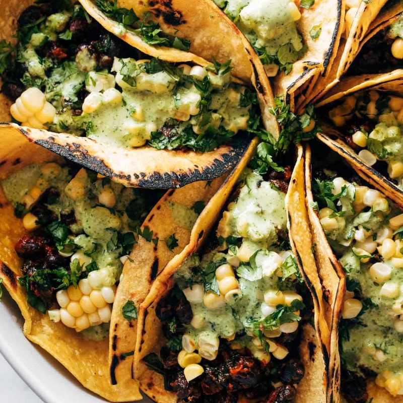 A picture of Smoky Beans & Greens Tacos with Aji Verde