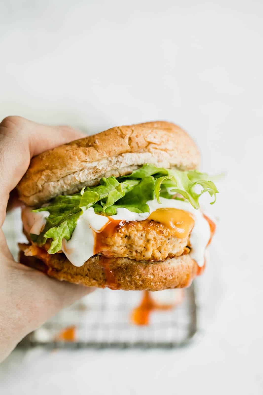 buffalo chicken burgers I howsweeteats.com #buffalo #chicken #burgers