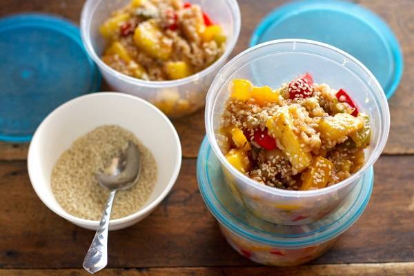 Sweet and sour fish in clear containers.