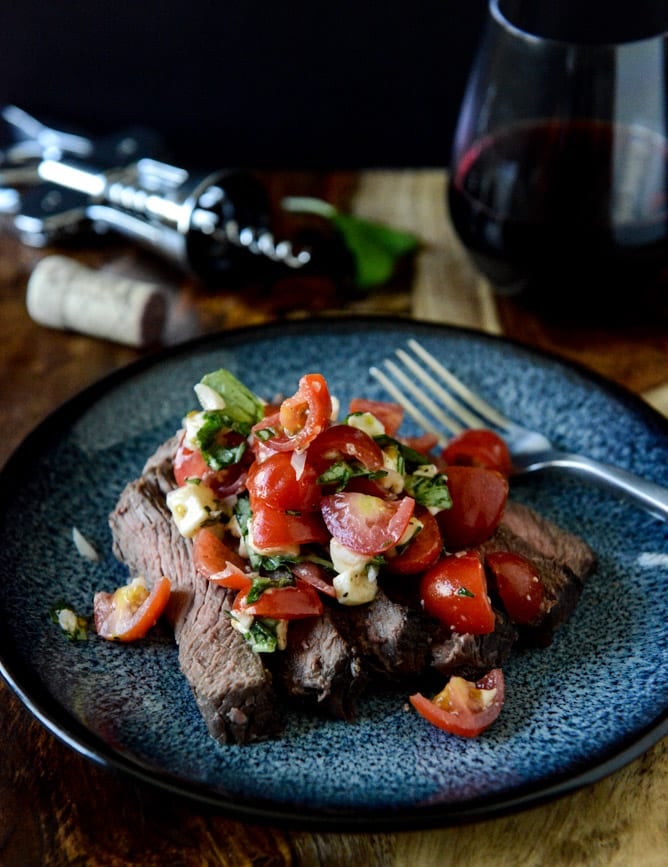 Red Wine Marinated Flank Steak with Cherry Tomato Caprese Salsa I howsweeteats.com