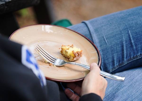 Plate with a fork and a piece of food.
