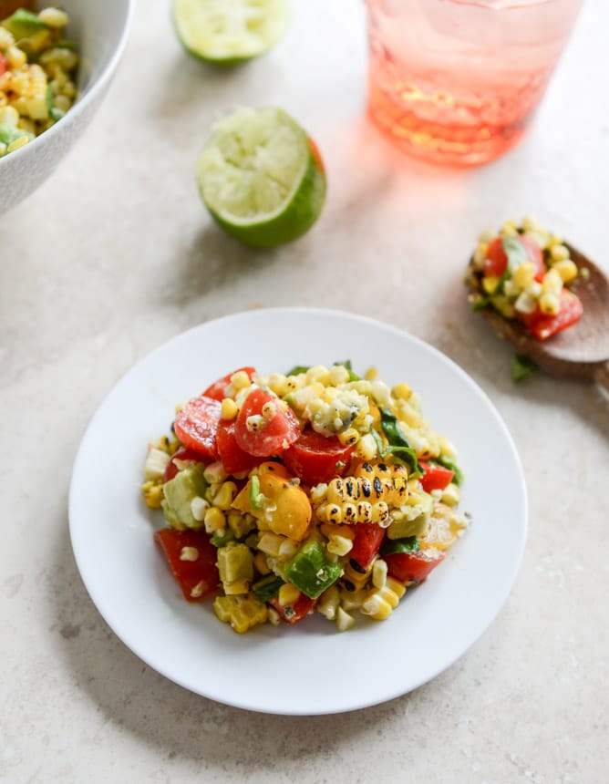 Easy Grilled Corn Tomato Salad with Blue Cheese and Basil Ribbons I howsweeteats.com