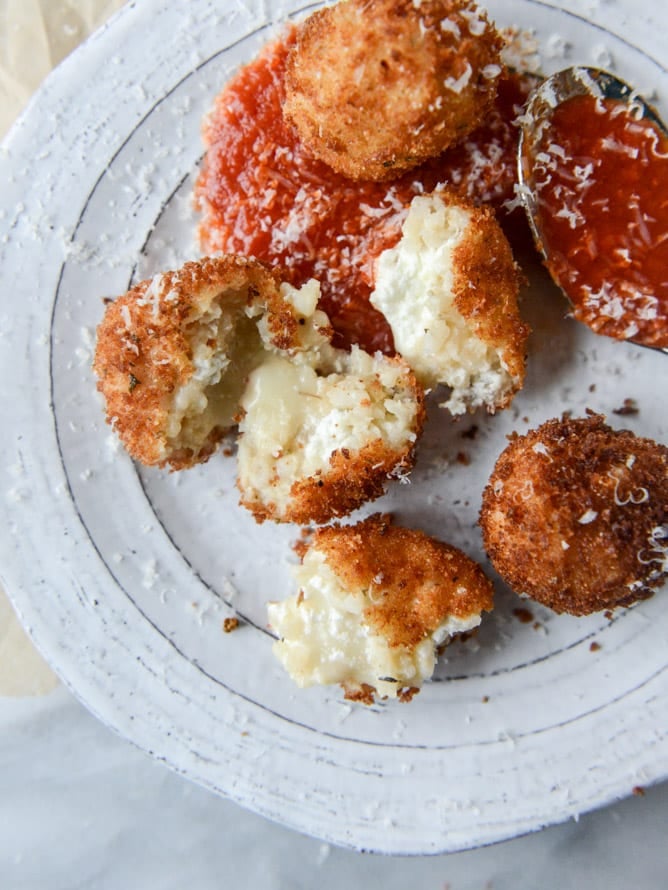 fontina, roasted garlic and goat cheese arancini I howsweeteats.com