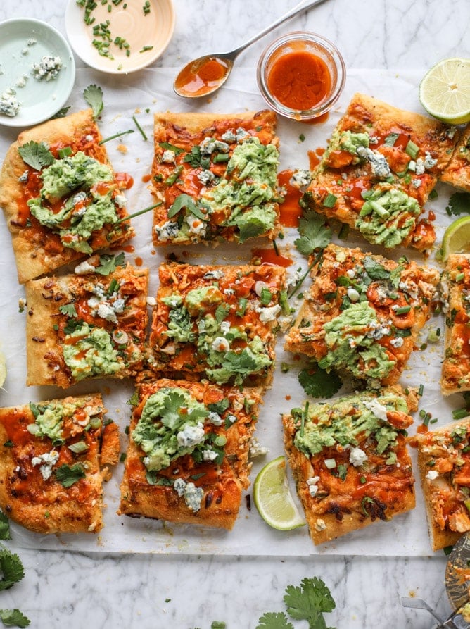 guacamole buffalo chicken pizza I howsweeteats.com #buffalochicken #pizza #guacamole #buffalowing
