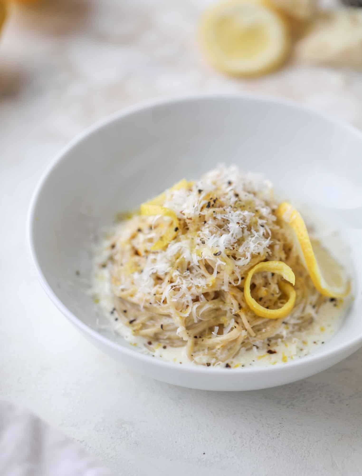 This cozy lemon pasta is light, refreshing and perfect for dinner when paired with a simple greens salad. It comes together in 20 minutes! I howsweeteats.com #lemon #pasta