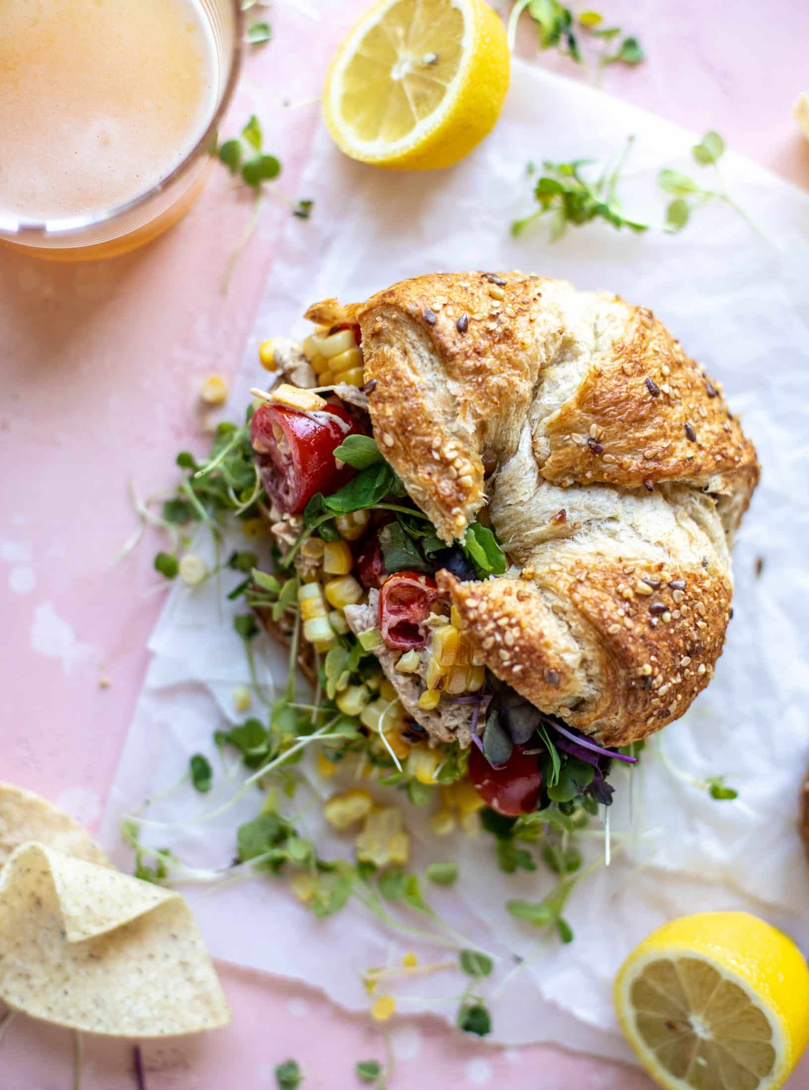 This smoky summer chicken salad is incredible! So much flavor from grilled chicken, sweet cherry tomatoes, corn, cheddar cheese and a secret ingredient!