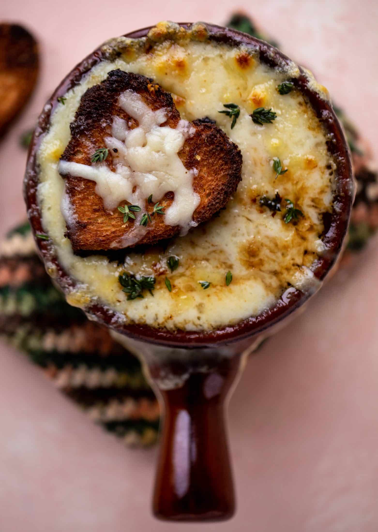 My favorite french onion soup starts with bourbon caramelized onions! Adorable heart croutons and tons of gruyere take it over the top.