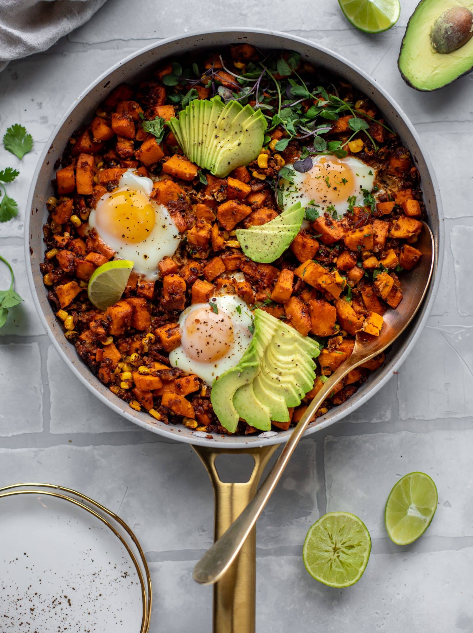 This chipotle sweet potato hash is perfect for breakfast, lunch or dinner. Bulked up with quinoa and tons of flavor, it's a great pantry weeknight meal!