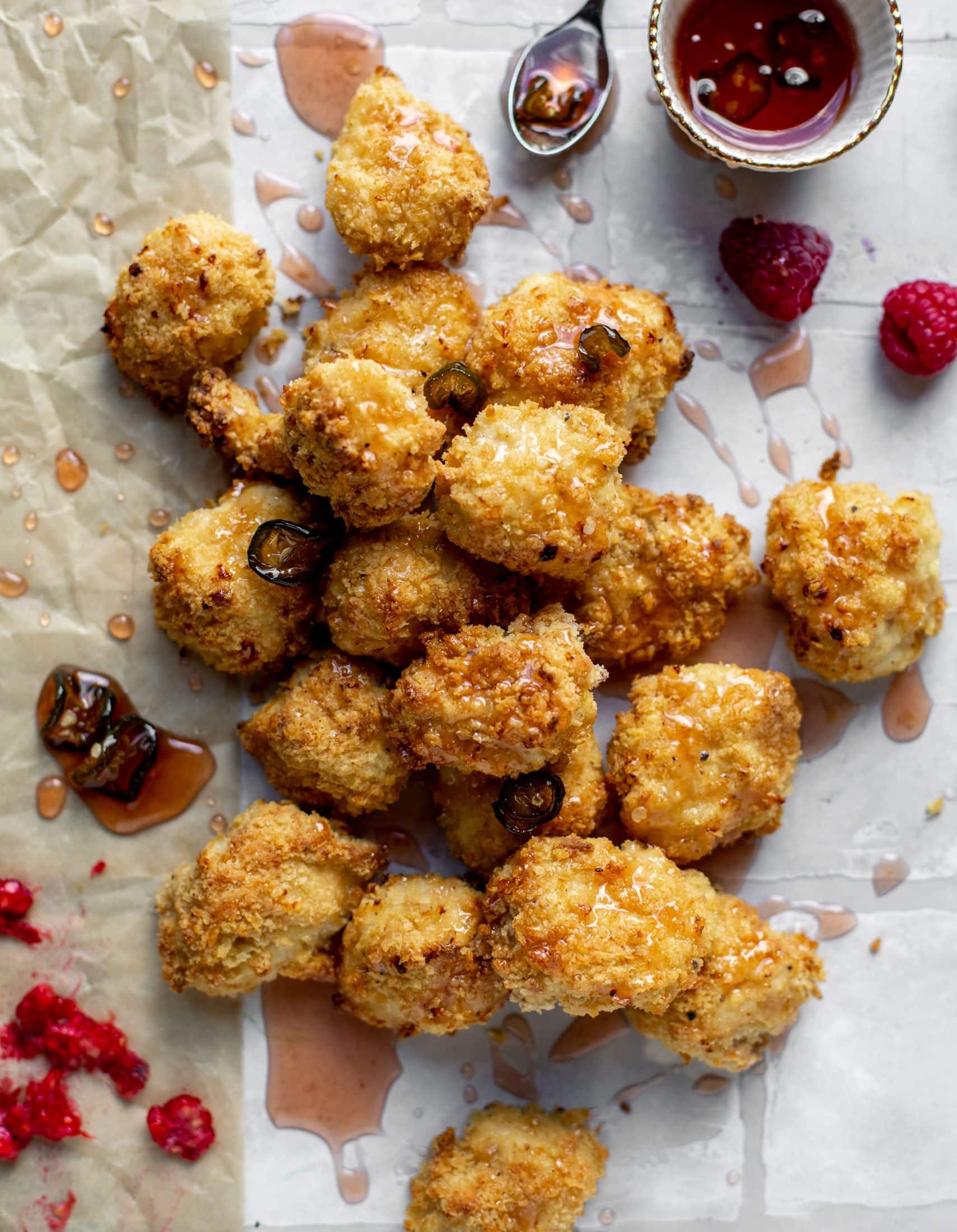 baked popcorn chicken with raspberry hot honey