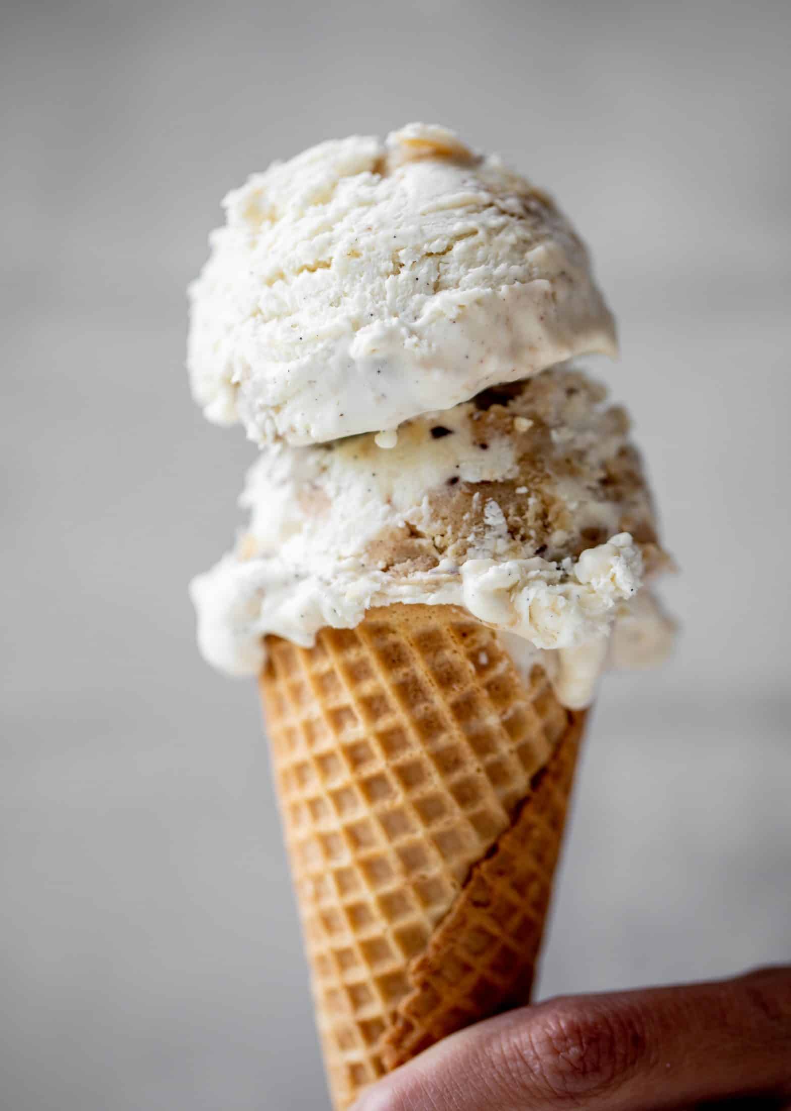 scoop of no churn salted chocolate chip cookie dough ice cream on a sugar cone