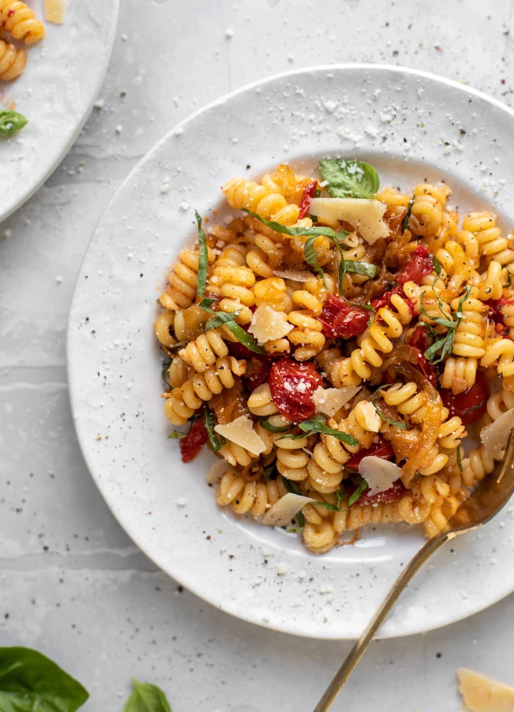 caramelized onion tomato pasta with basil