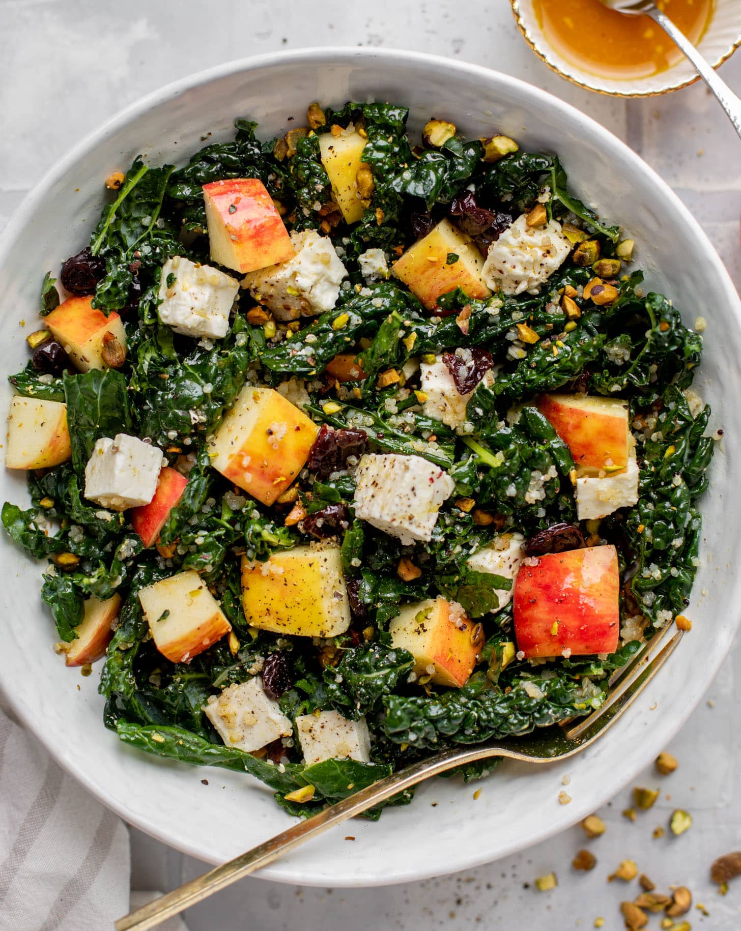 honeycrisp quinoa salad with kale and pistachios