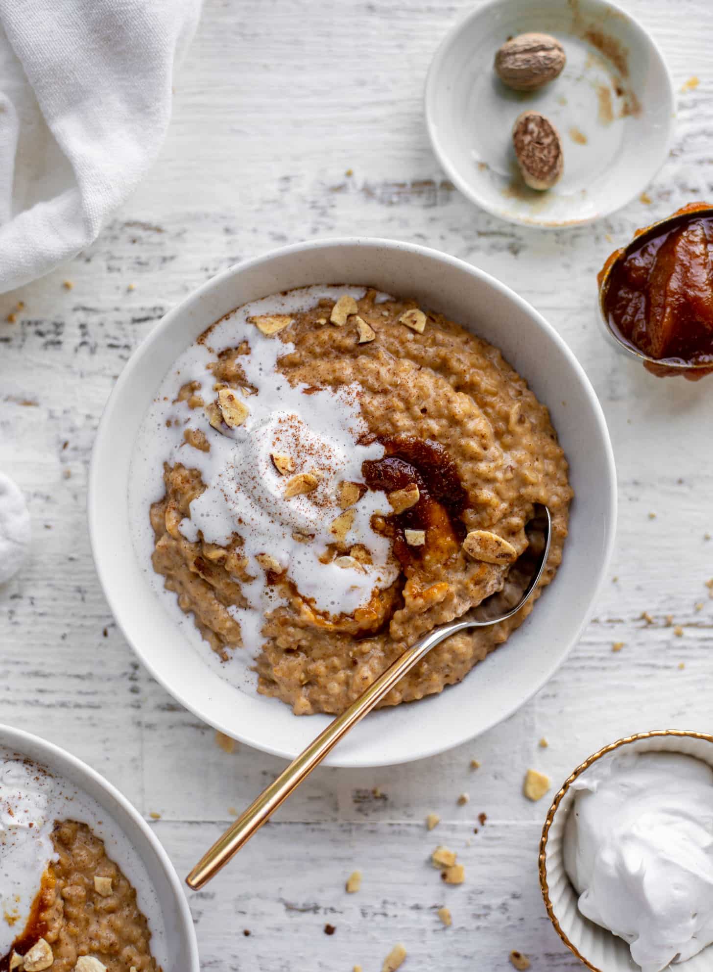pumpkin pie oatmeal with coconut cream and almonds