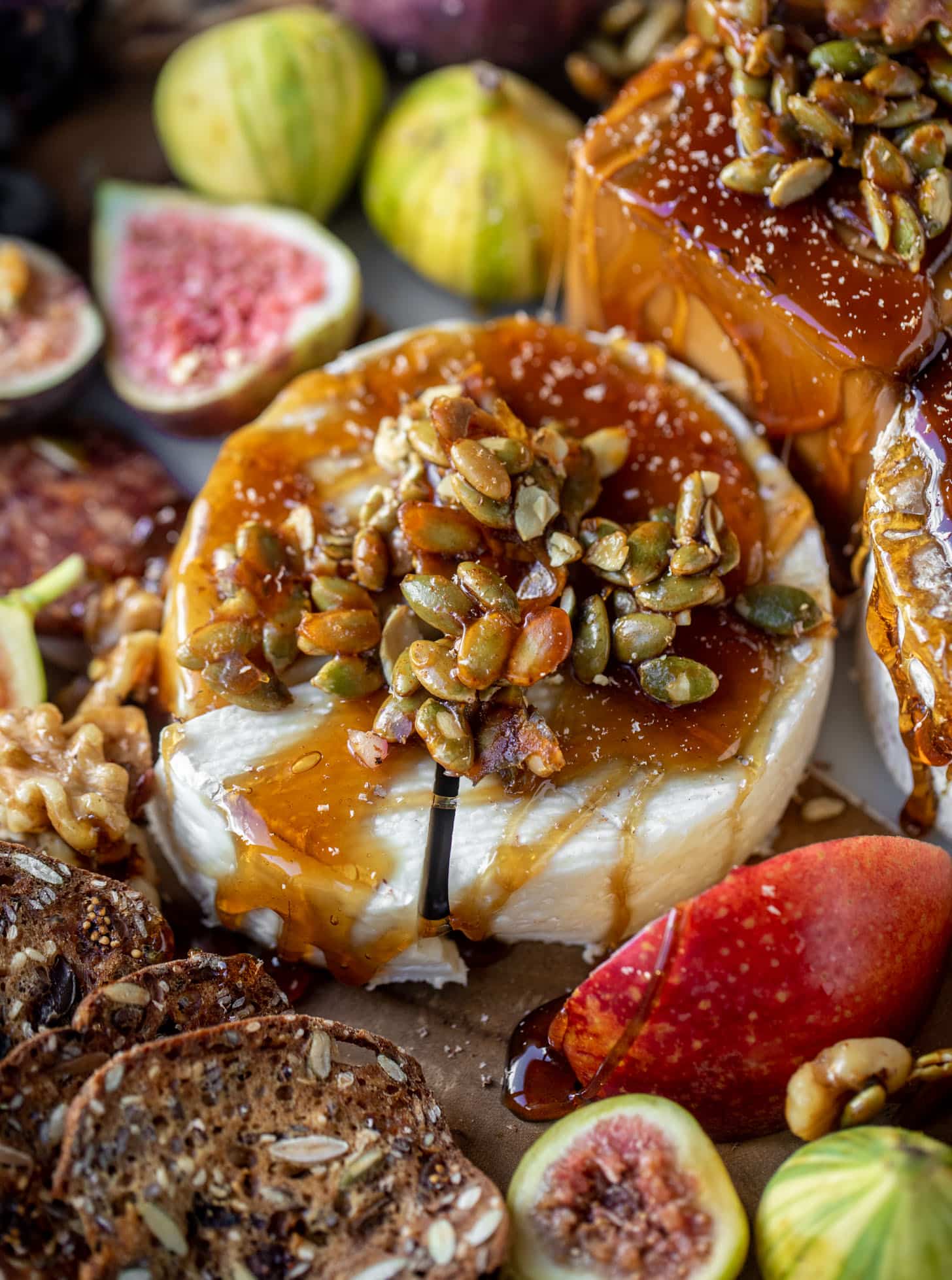 autumn cheese board with bourbon crackling caramel and honey roasted pepitas