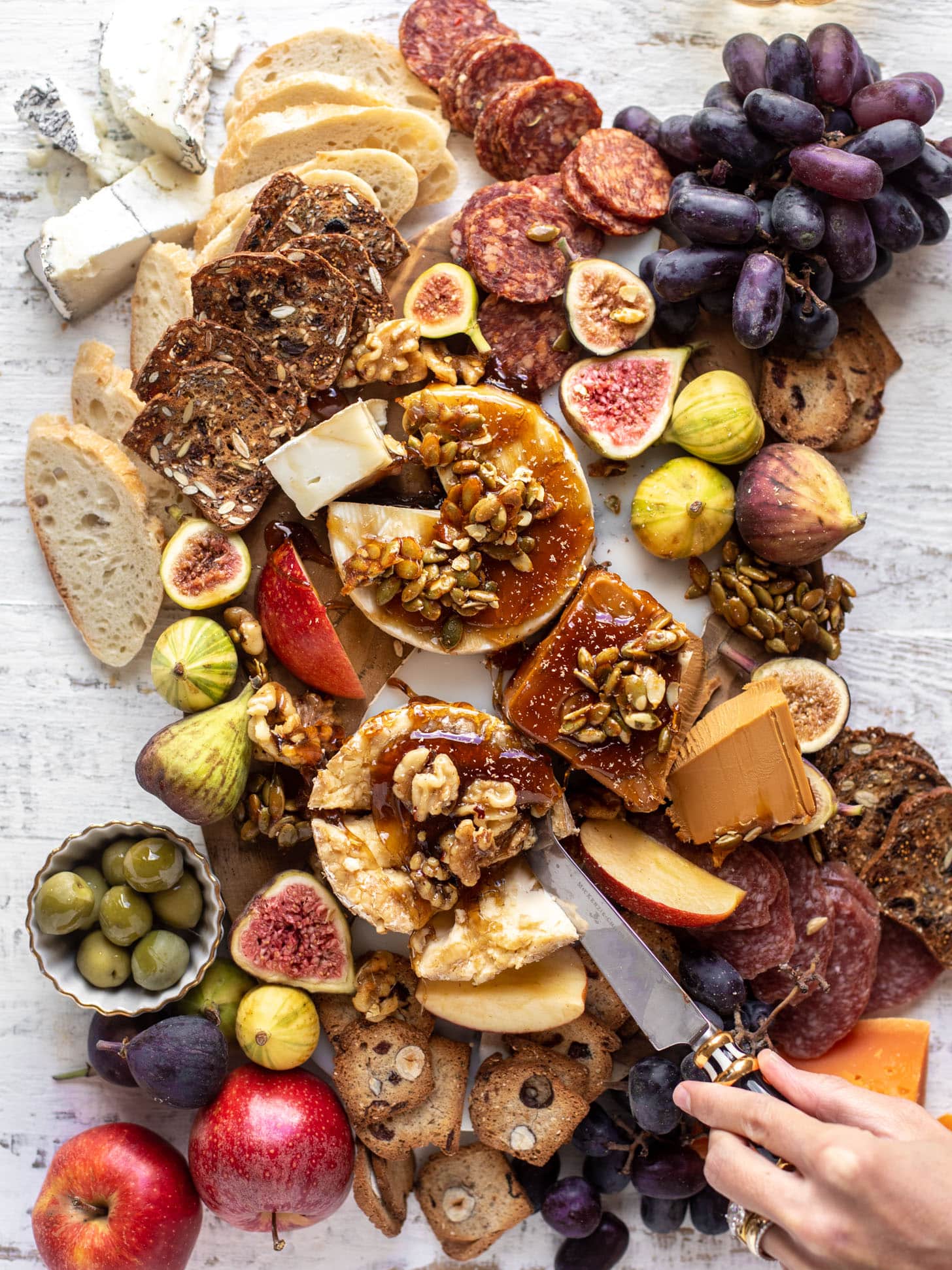 autumn cheese board with bourbon crackling caramel and honey roasted pepitas