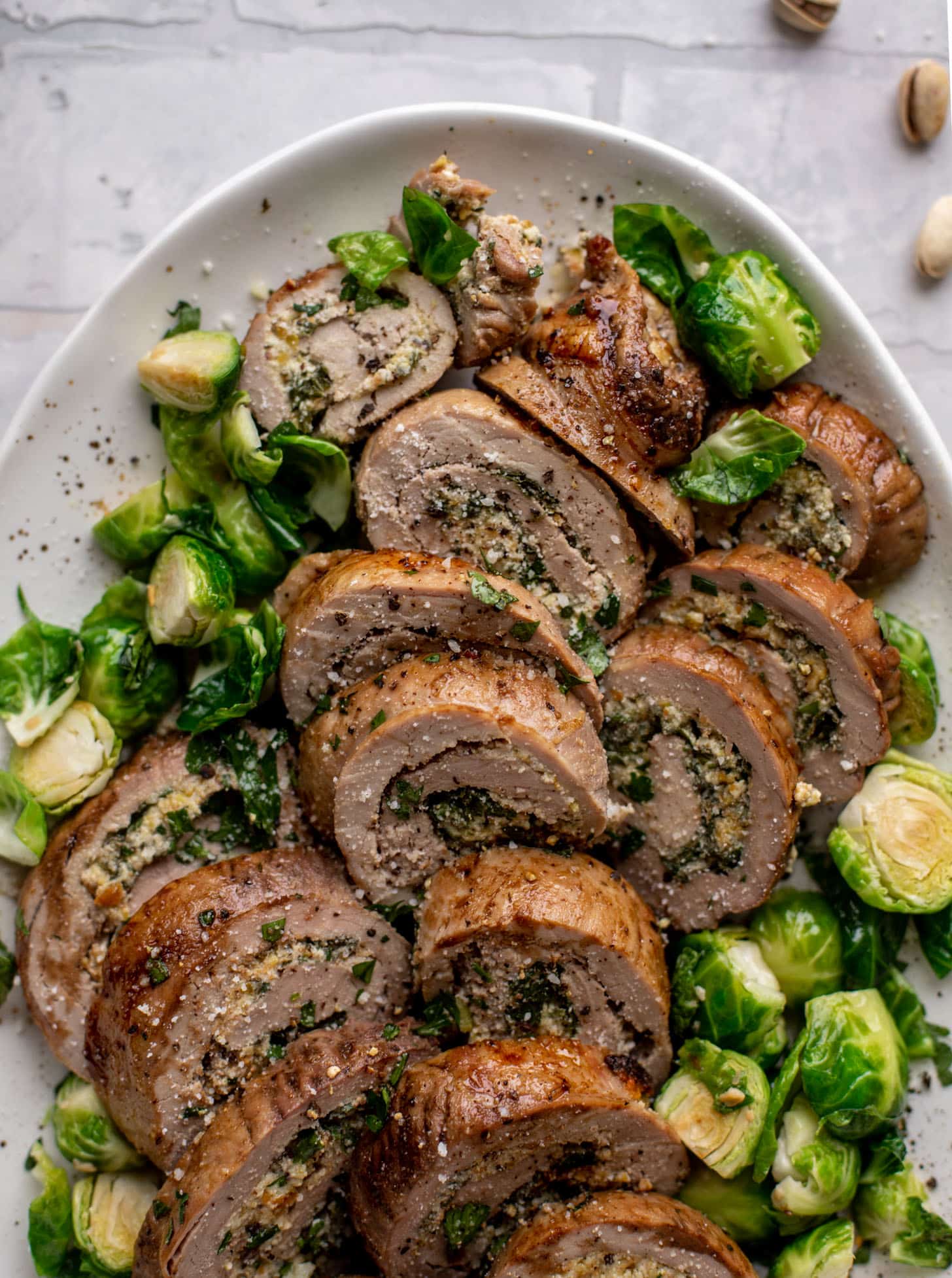 parmesan pistachio stuffed pork tenderloin with brussels sprouts