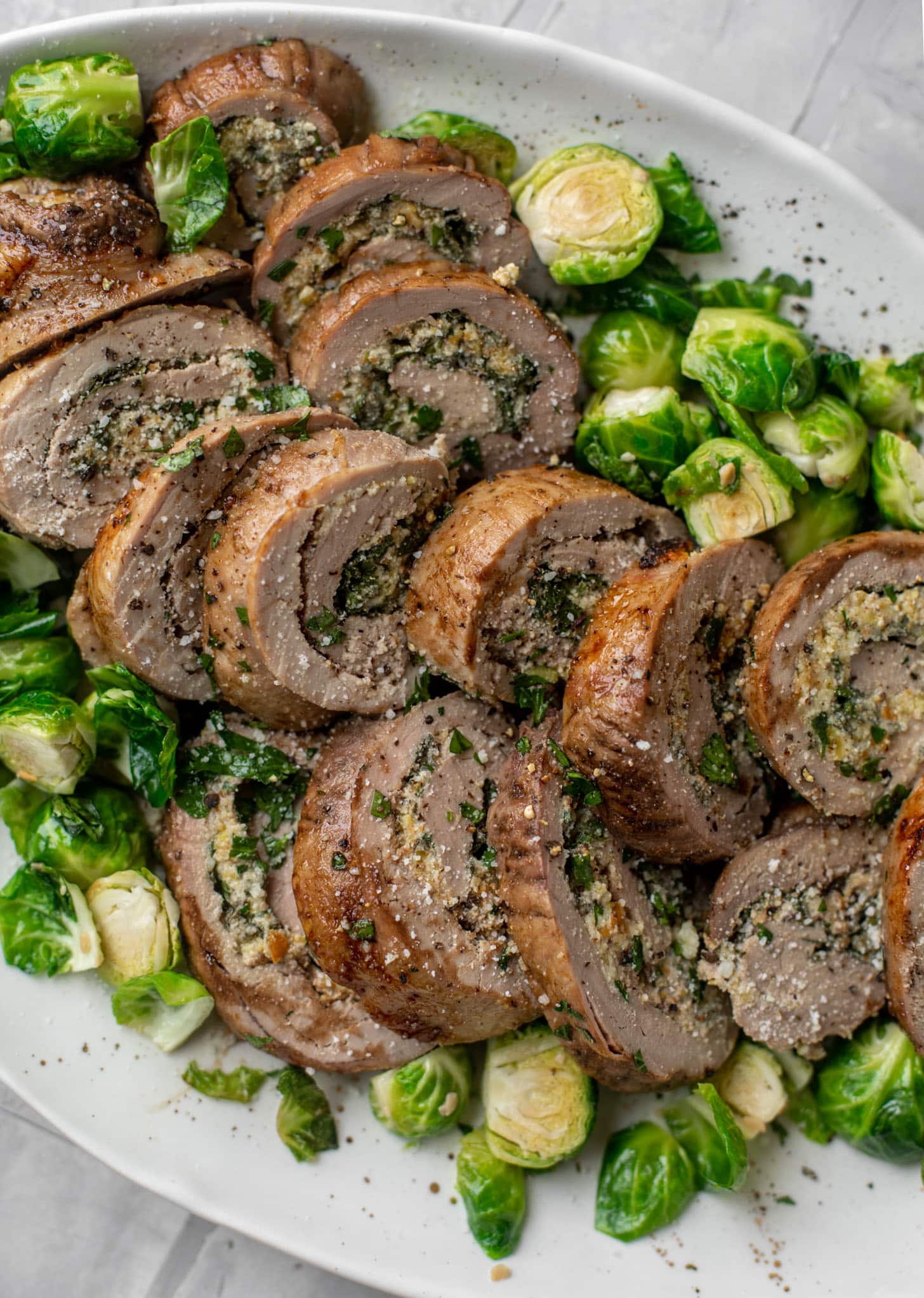 parmesan pistachio stuffed pork tenderloin with brussels sprouts