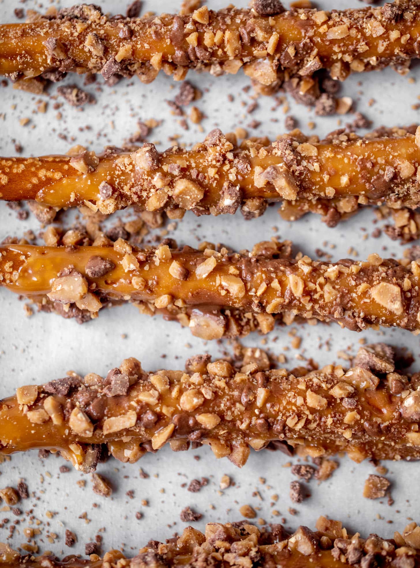 pretzels dipped in caramel and toffee