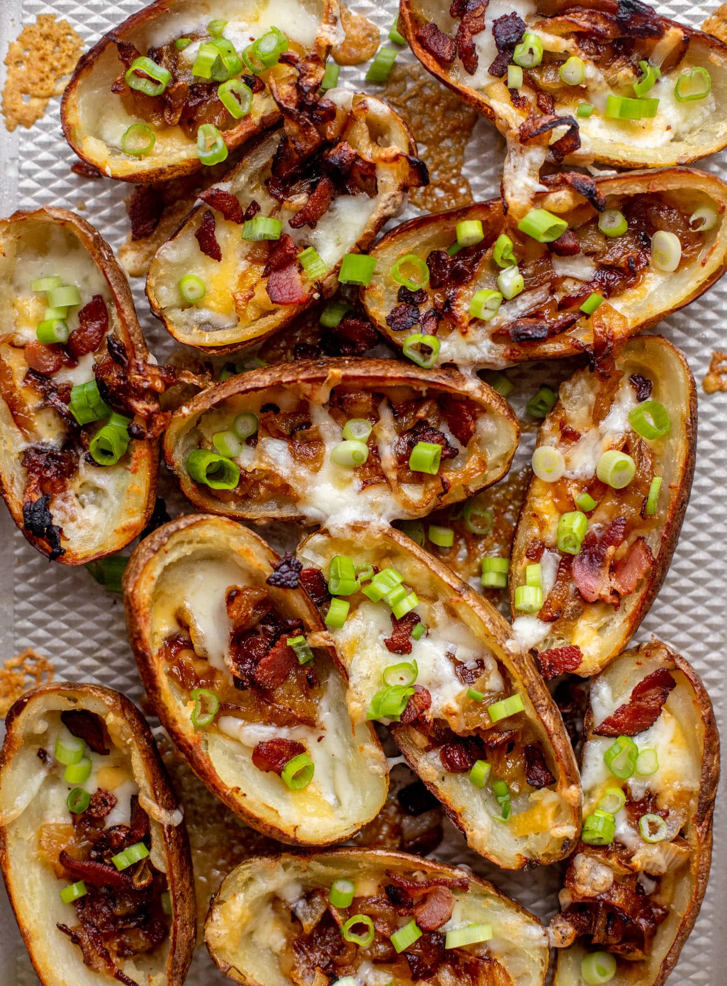 smoked cheddar and caramelized onion potato skins 
