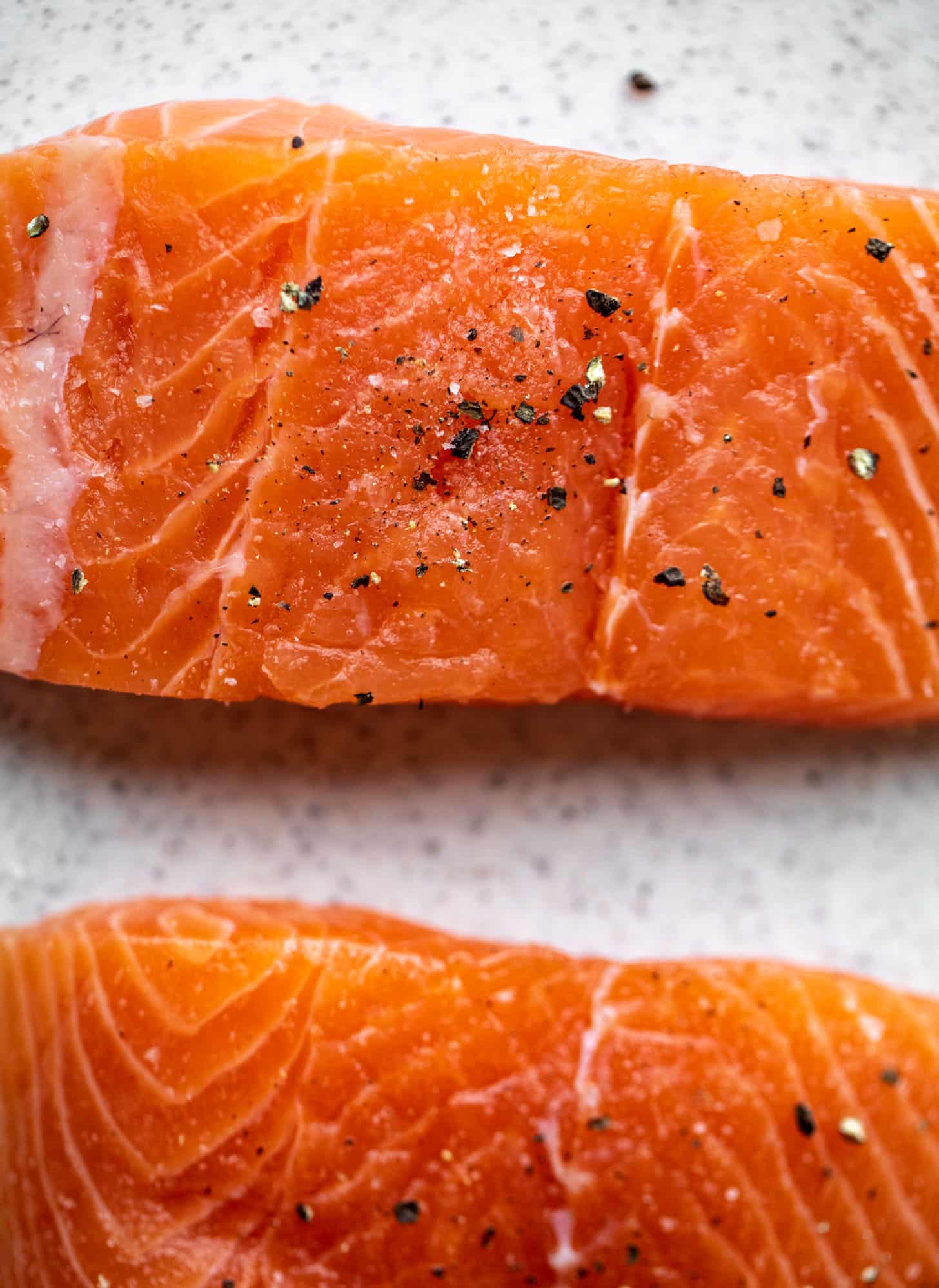 fresh salmon with salt and pepper