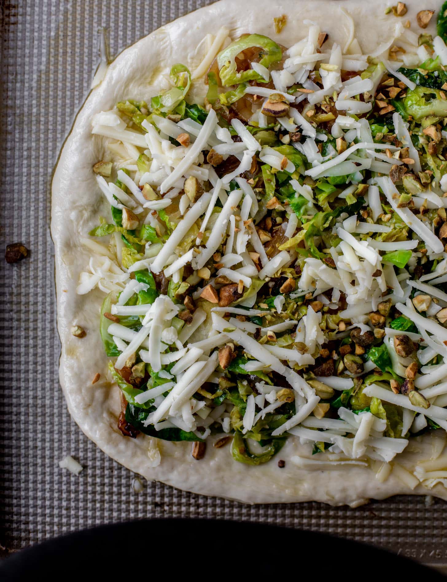 pizza dough with toppings