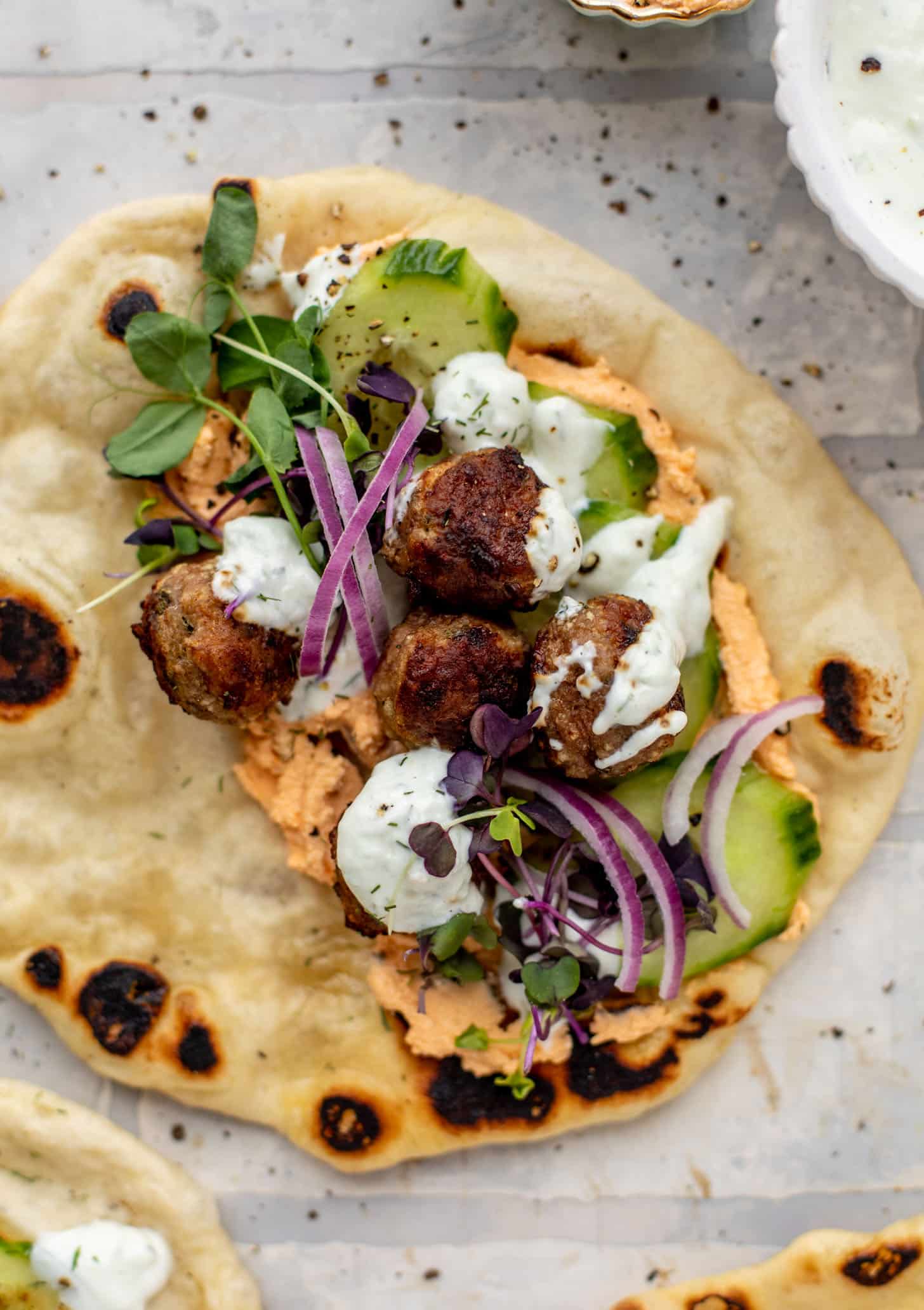 chicken meatball pitas with roasted red pepper whipped feta