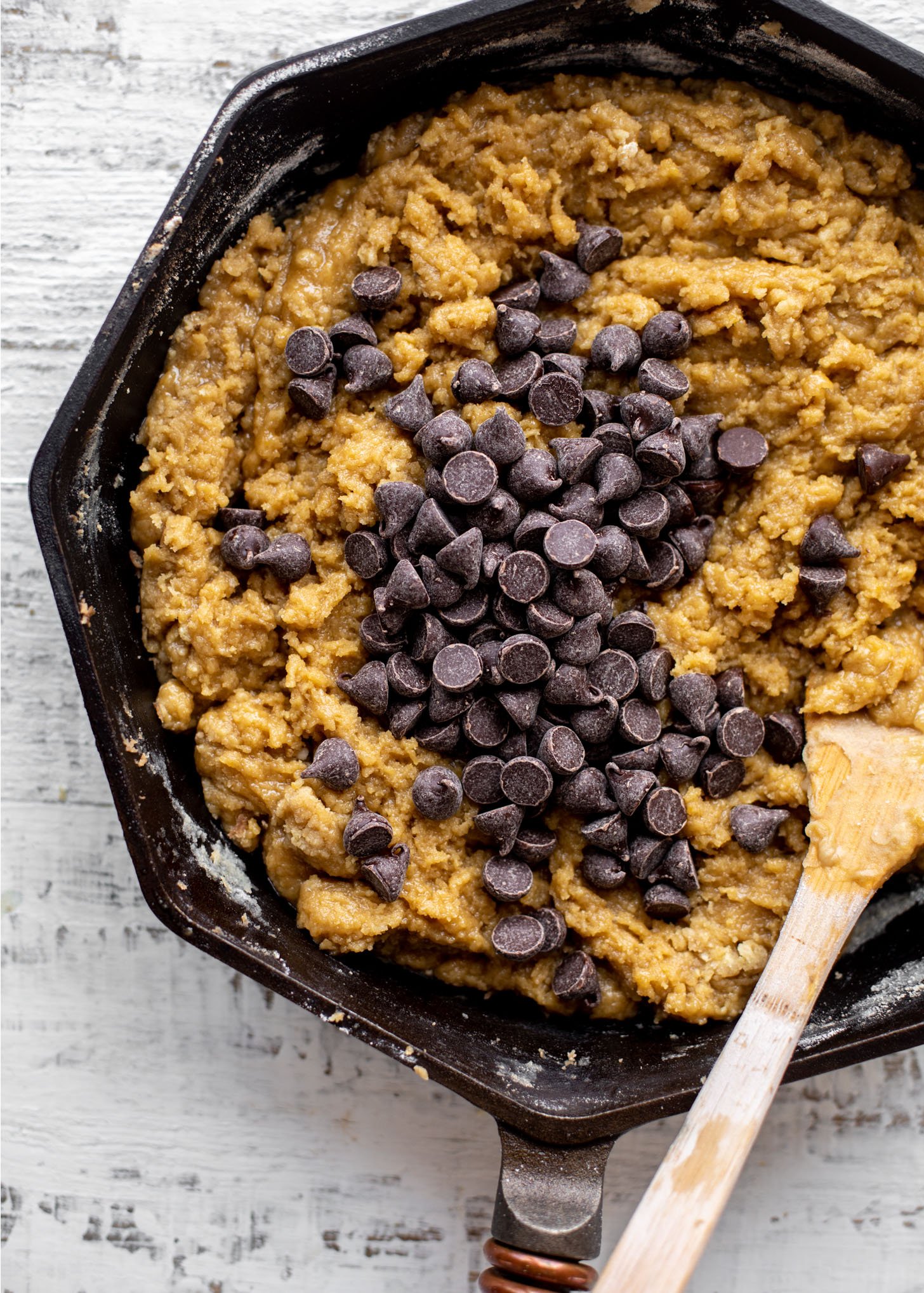 cookie dough and chocolate chips in skillet