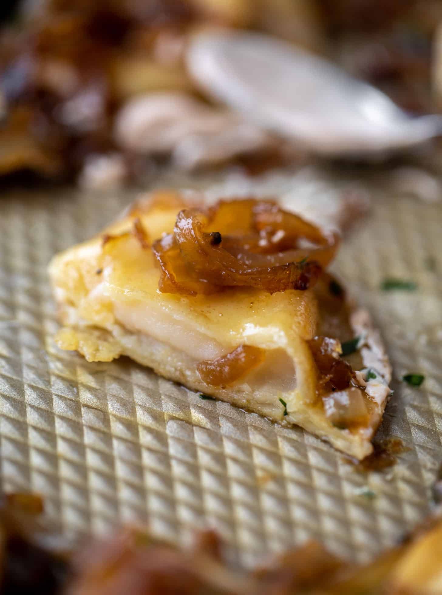 sheet pan pierogies with caramelized onions and chipotle sour cream