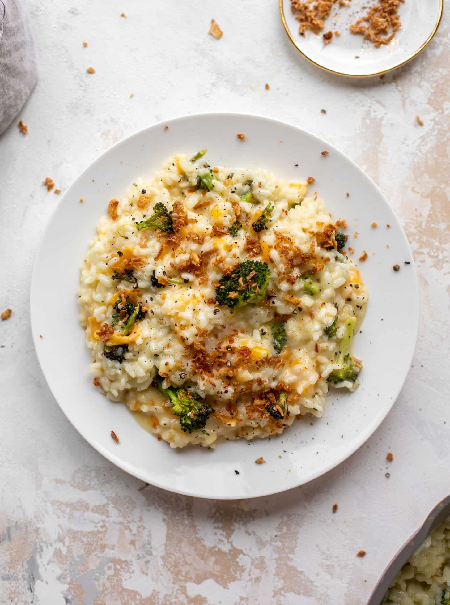 roasted broccoli cheddar risotto with crispy onions