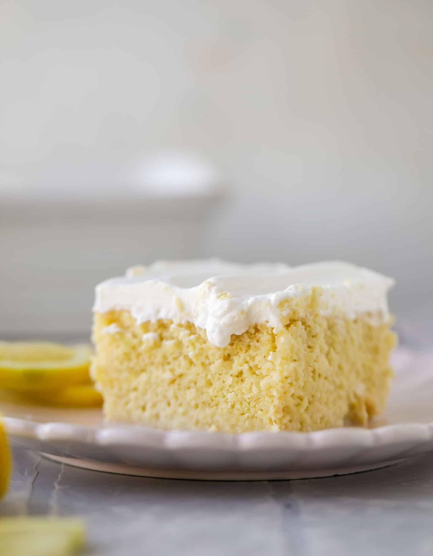simple lemon tres leches cake with whipped cream