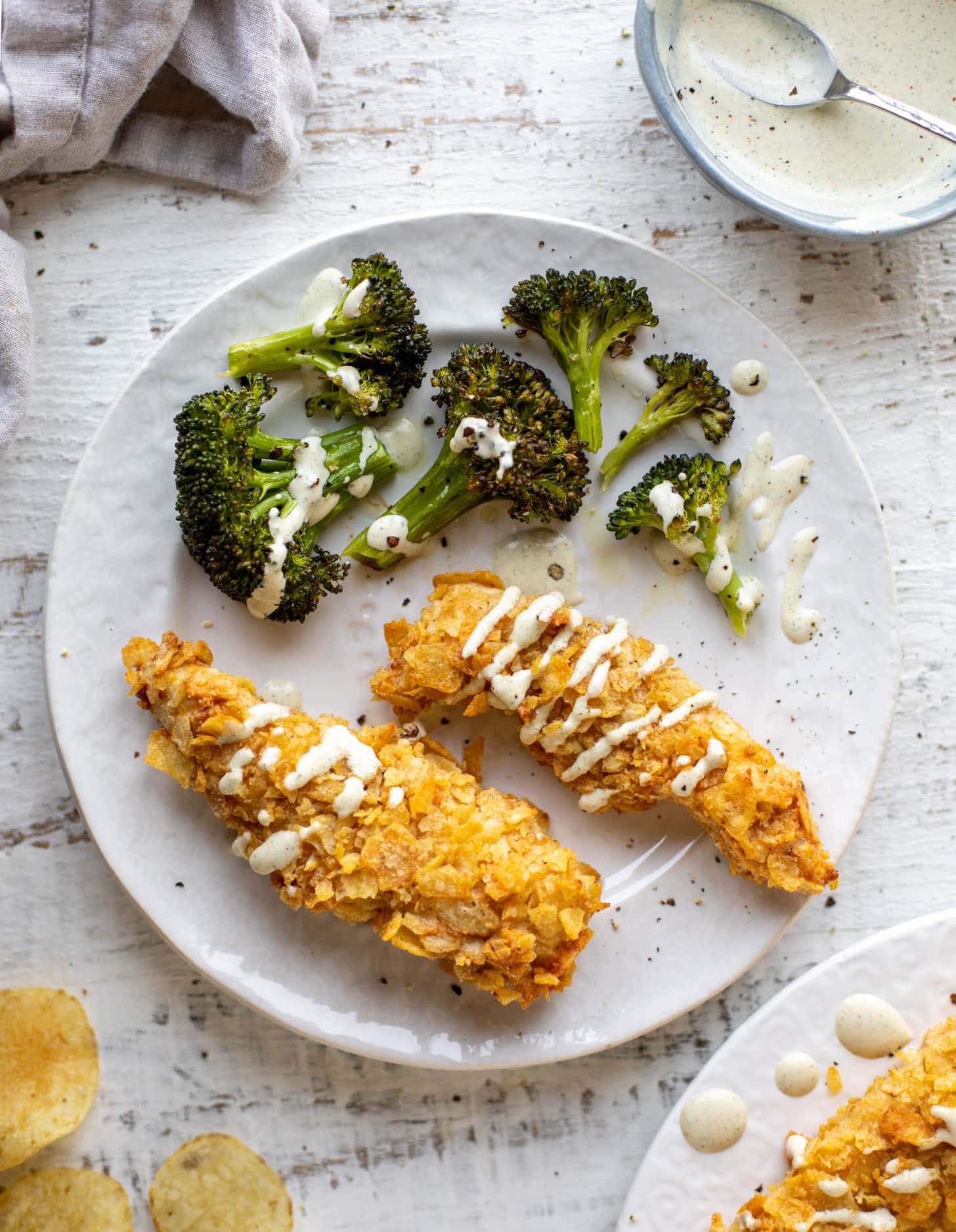 potato chip crusted chicken fingers with ranch and roasted broccoli