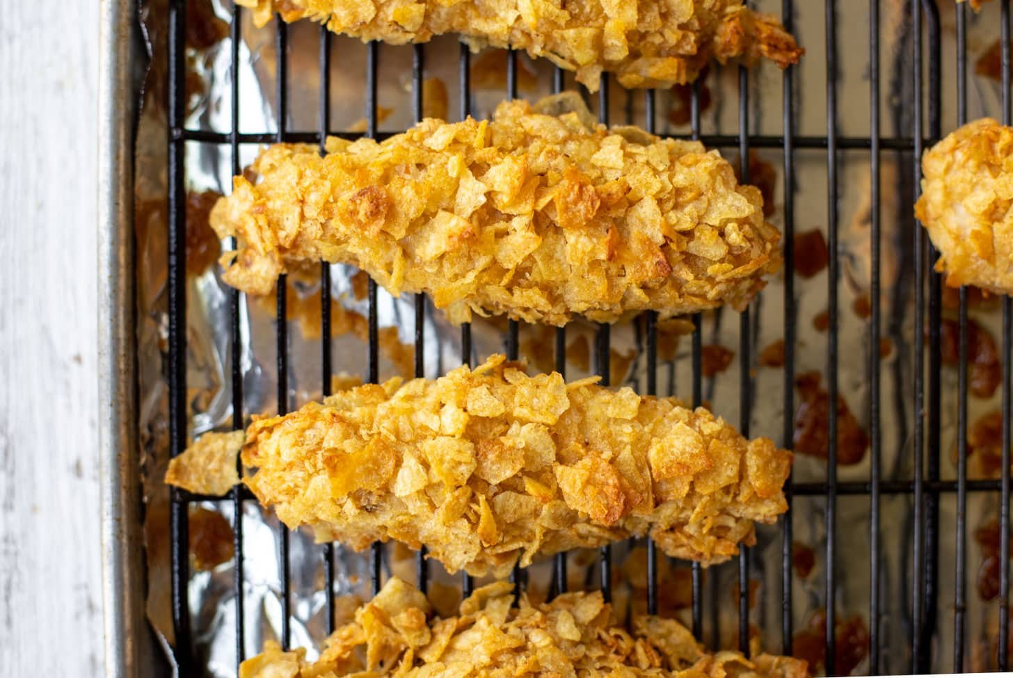 potato chip crusted chicken fingers right after baking