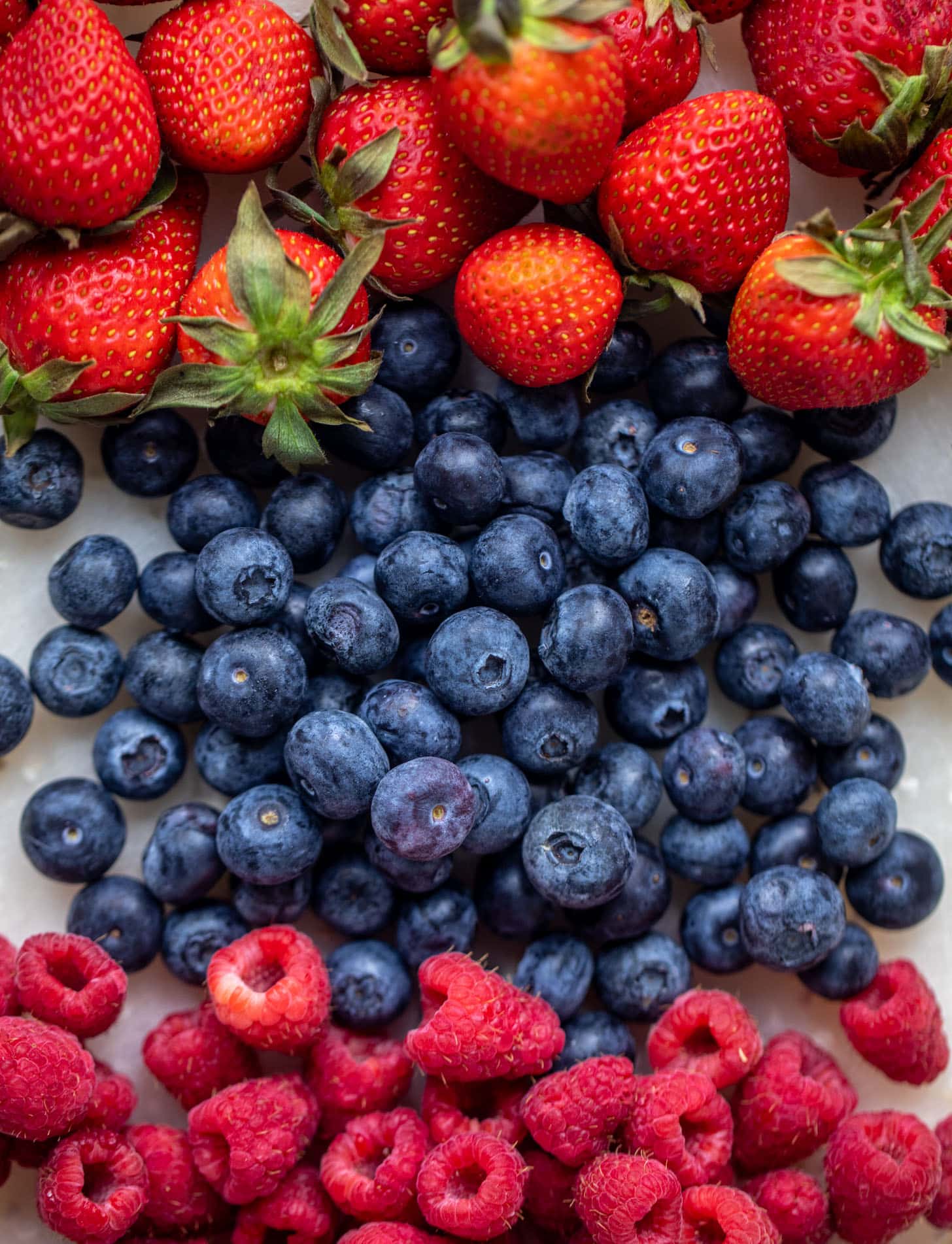 strawberries, blueberries and raspberries