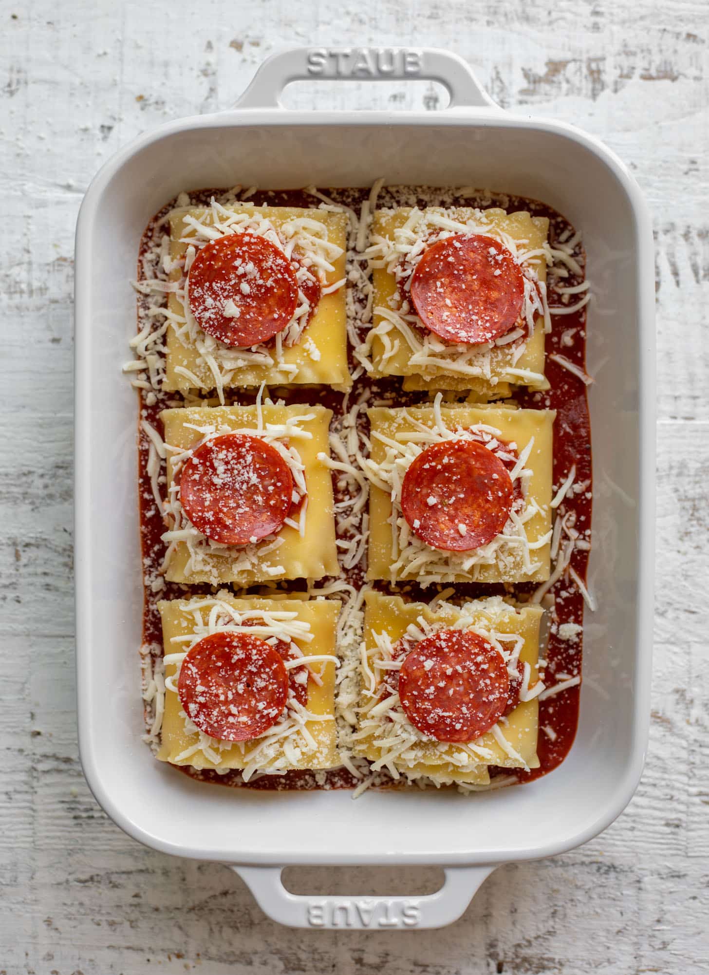 pepperoni pizza lasagna roll ups ready for the oven