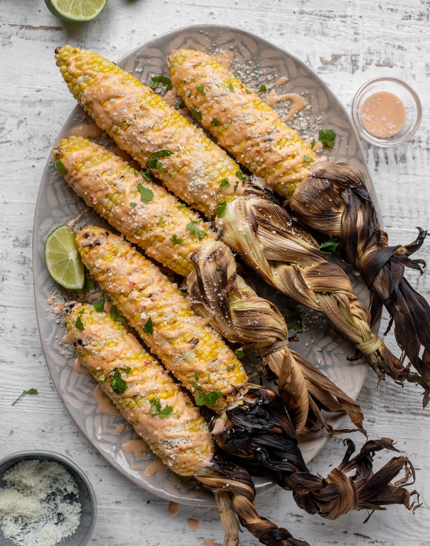 bang bang grilled corn with cotija cheese