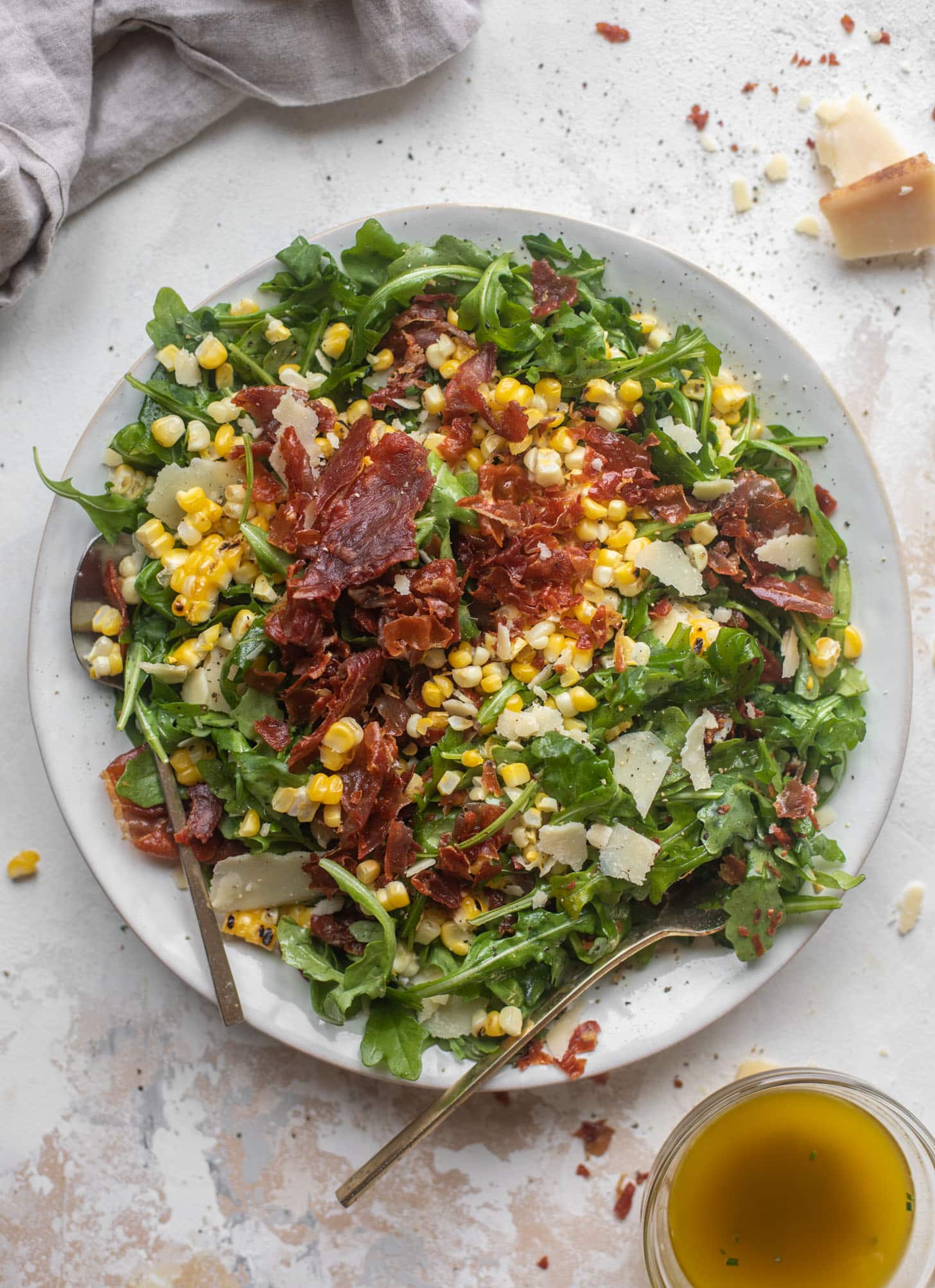 crispy prosciutto & charred corn arugula salad