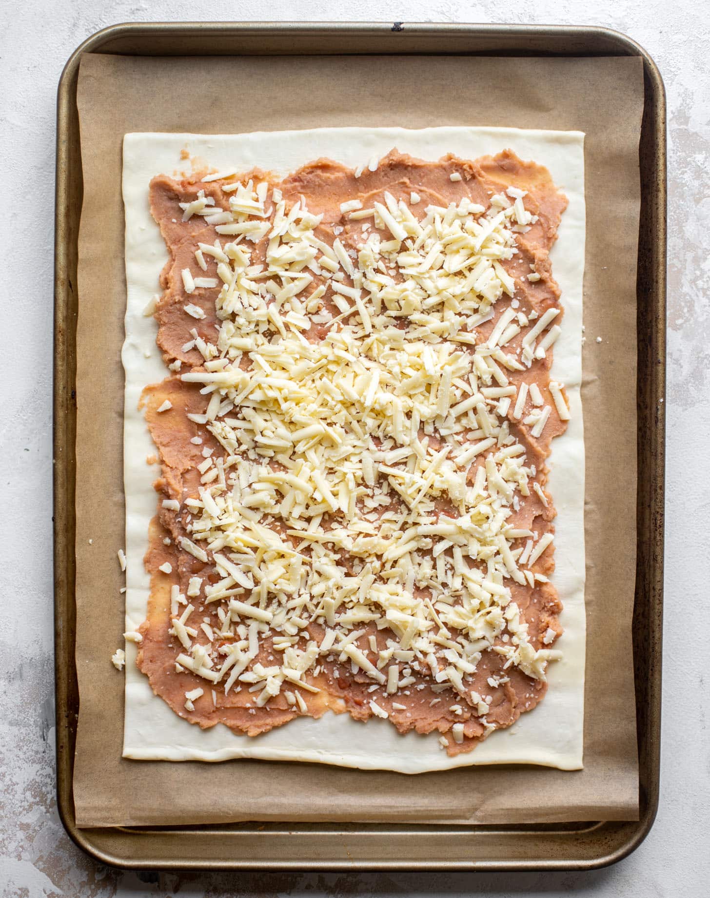 puff pastry with refried beans and cheese