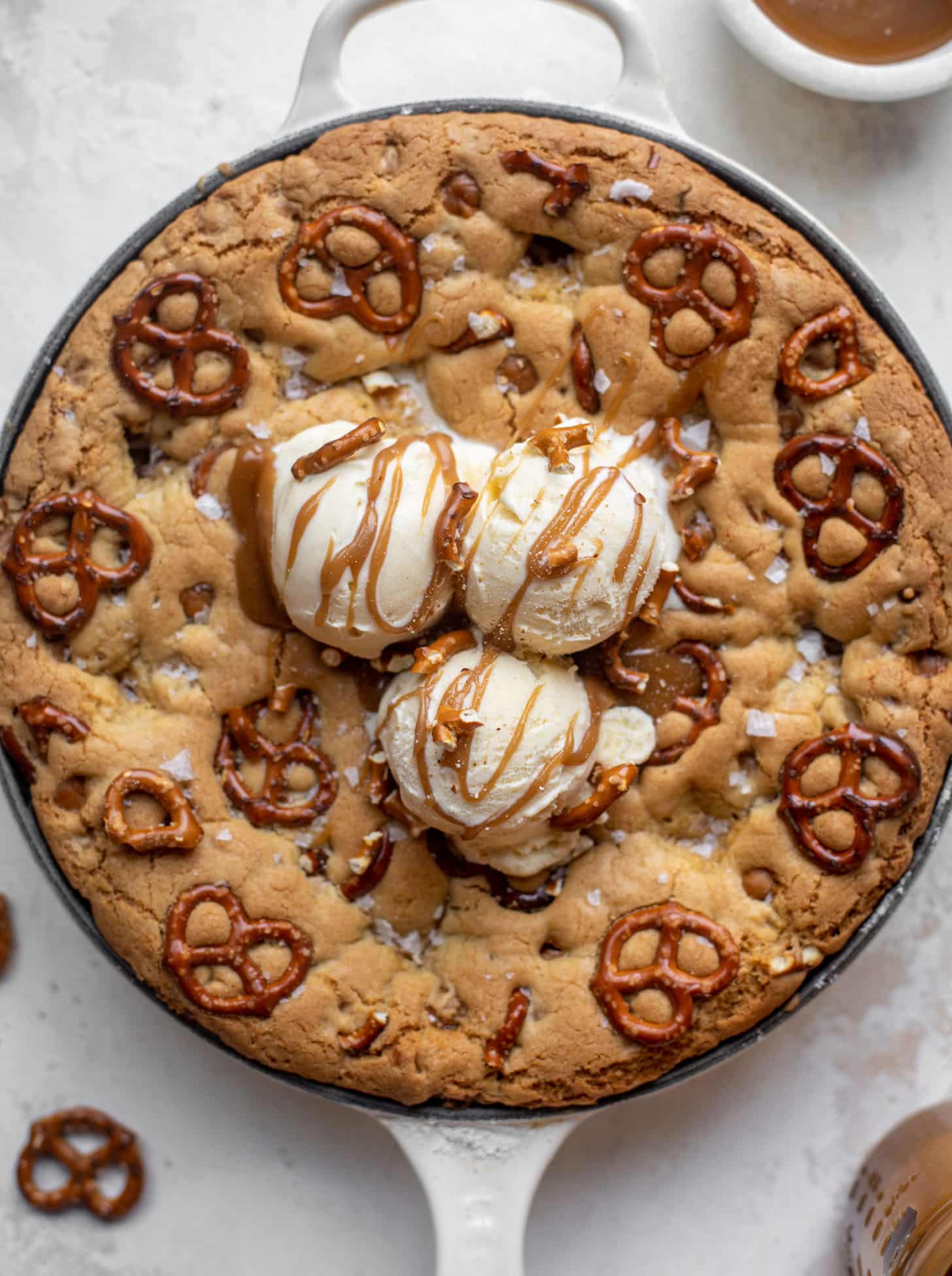 caramel pretzel skillet cookie with ice cream